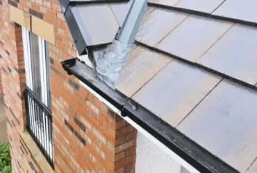 Roof cleaning in progress