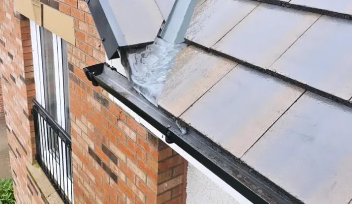 Roof cleaning in progress